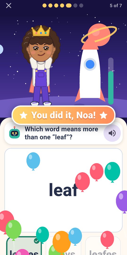 MeQuest: the hero cheers as balloons fly and the badge says You did it, Noa!